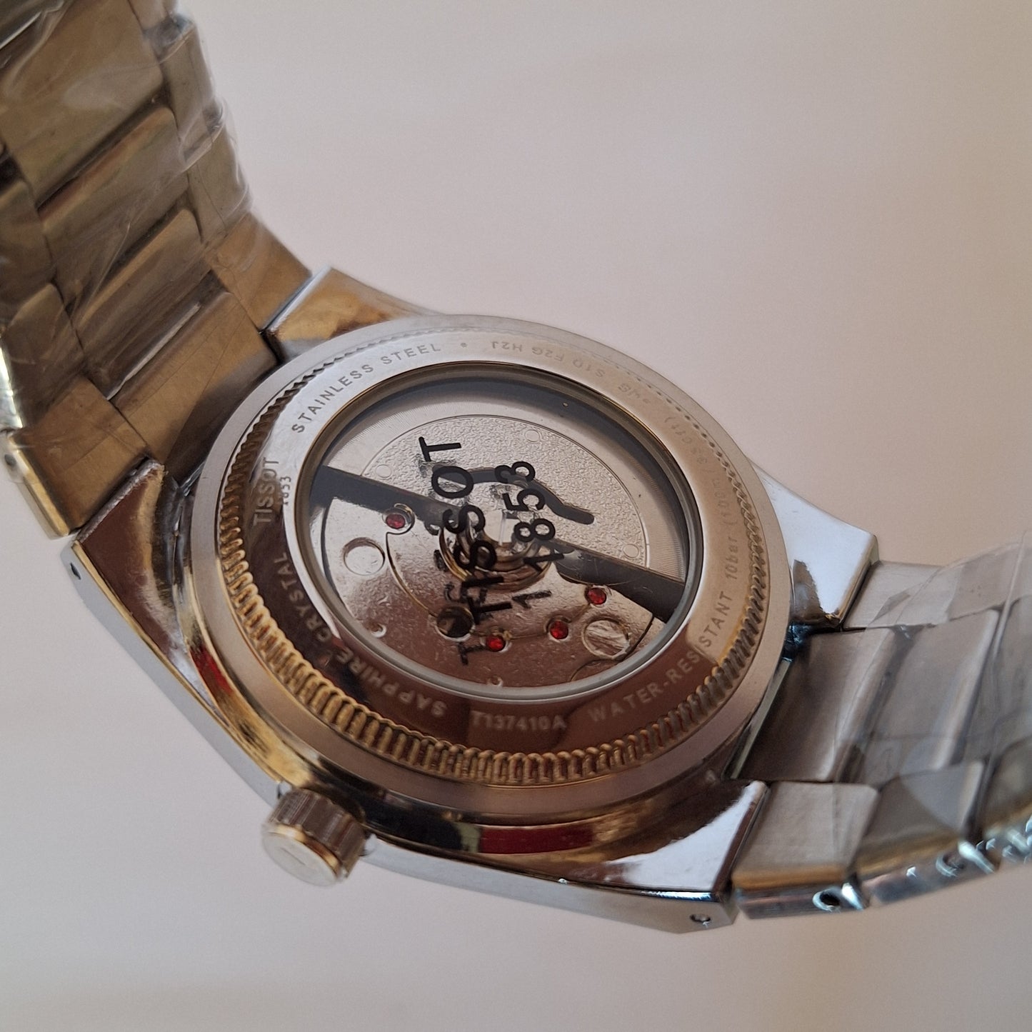 Tissot PRX ظهر شفاف