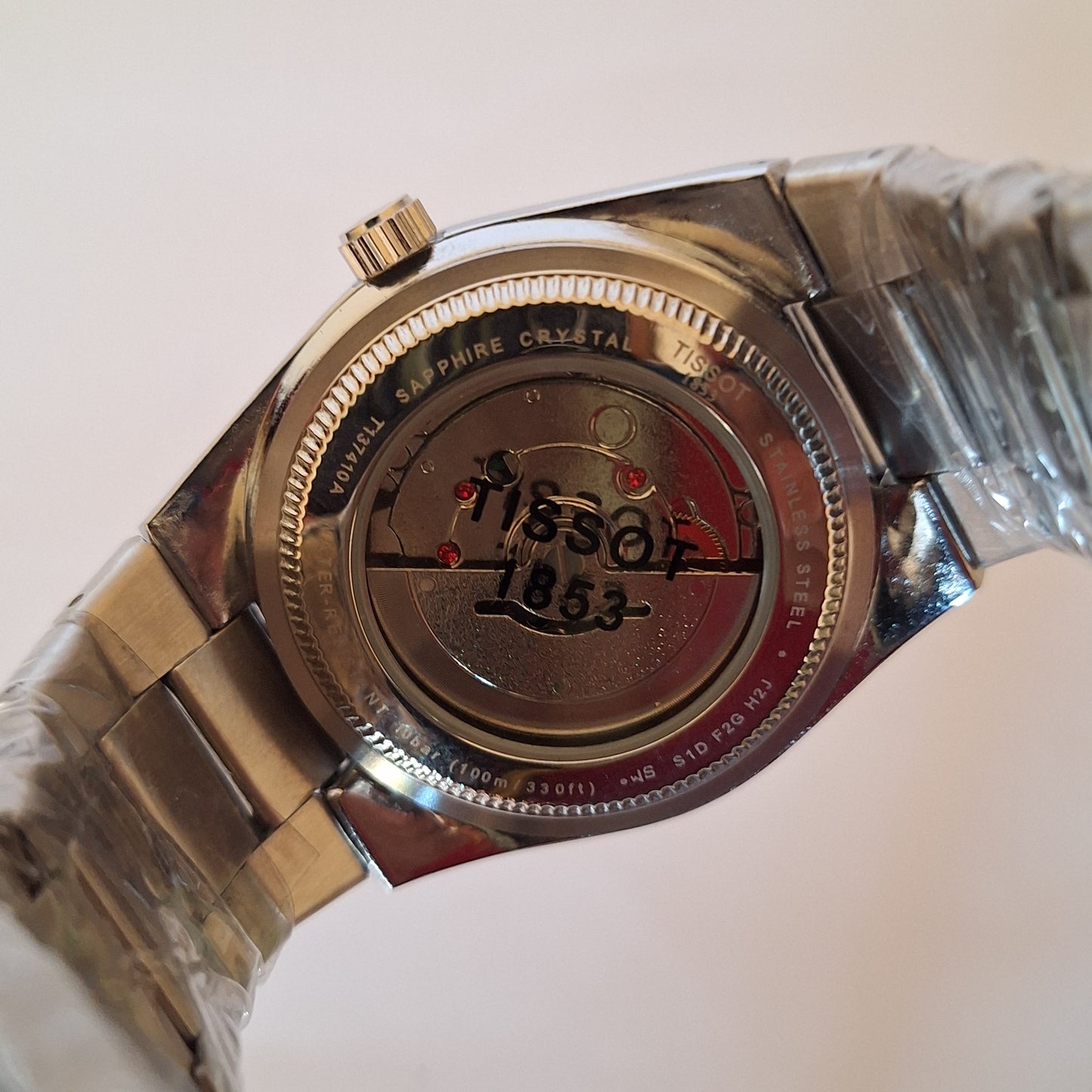 Tissot PRX ظهر شفاف