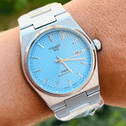 Tissot PRX ظهر شفاف